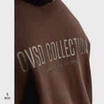 Brown SN Clo. hoody with 'OVSD Collection' text on a white background